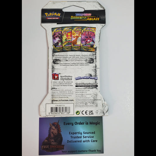 Back of a Pokémon TCG card pack package, showing the product reverse side with card art, text, barcode, and a separate branded insert card below on a white background.