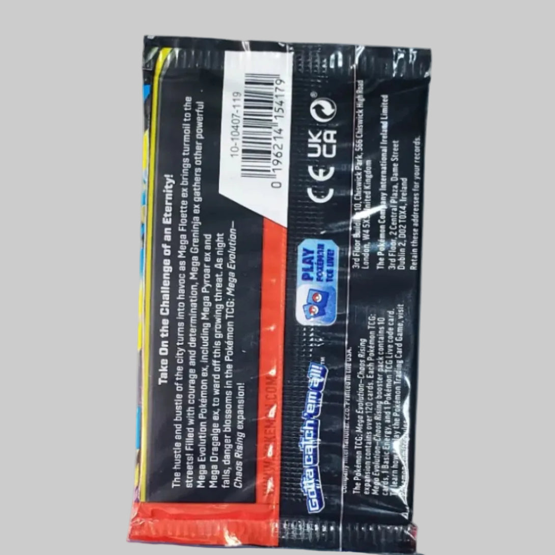 A sealed black product package with a barcode and small orange strip, placed above a printed card that reads 'Every Order is Magic' and 'True Unicorn,' on a light tabletop with a keyboard visible at the bottom.