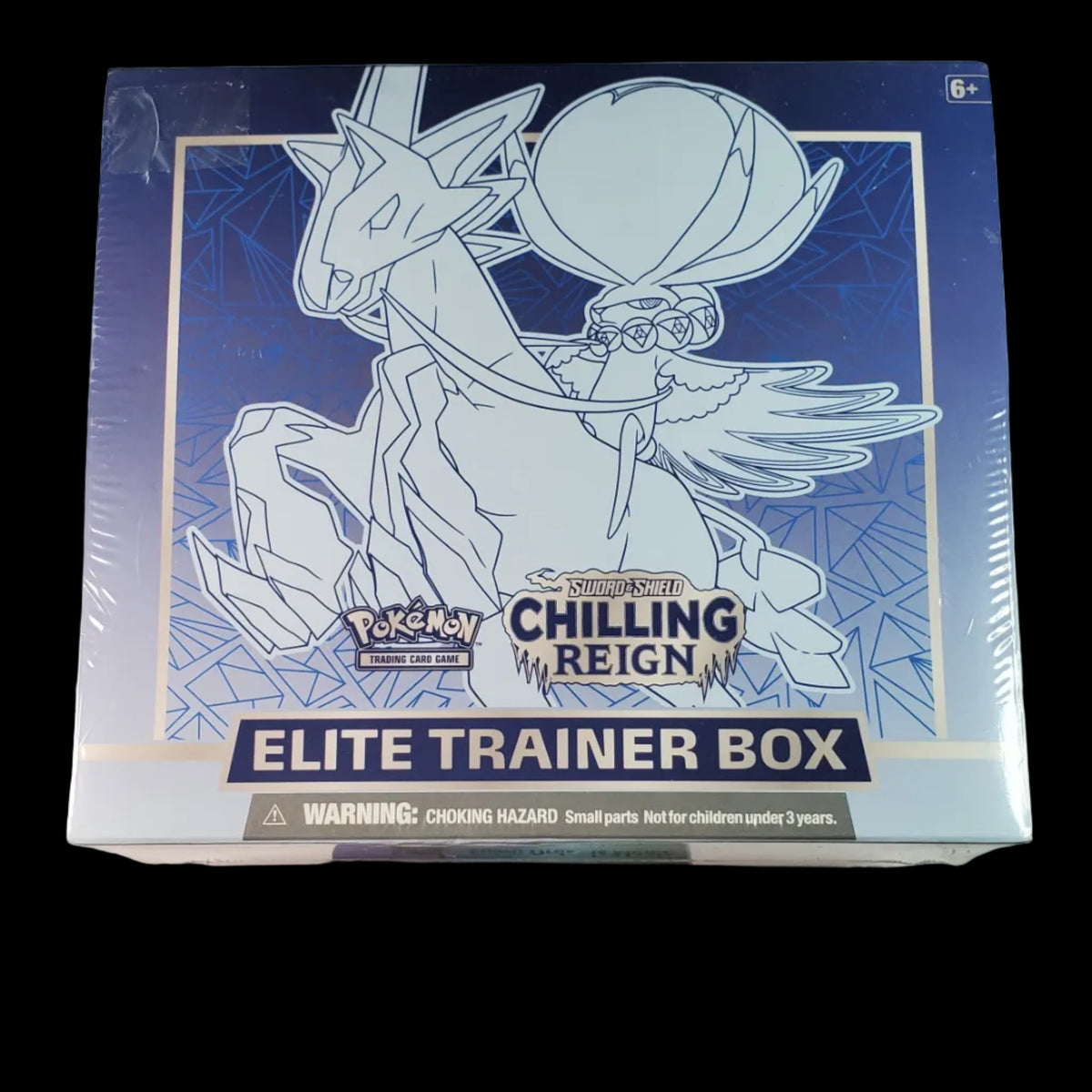 Pokémon Chilling Reign Elite Trainer Box in its shrink wrap, displayed on a desk 