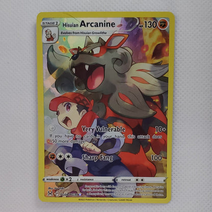 A Pokémon TCG trading card featuring Arcanine, displayed on a white textured surface with a small white stand below it.