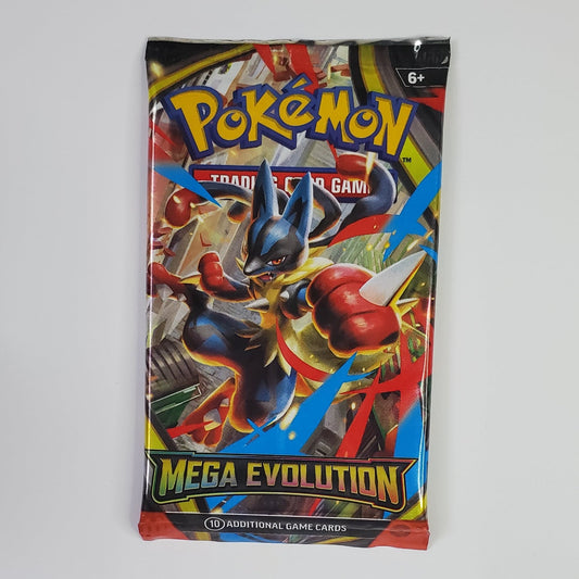 A sealed Pokémon TCG booster pack for 'Mega Evolution' stands upright against a plain white wall. The pack artwork features a dynamic illustration of a blue and red Pokémon character with the 'Pokémon' logo at the top and 'MEGA EVOLUTION' printed in large yellow text near the bottom.