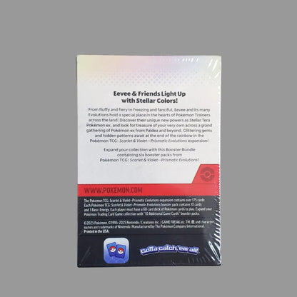 A boxed product photographed from above on a light gray surface. The package appears to be the back of retail packaging with mostly white, black, and red sections, plus a small blue logo near the bottom.