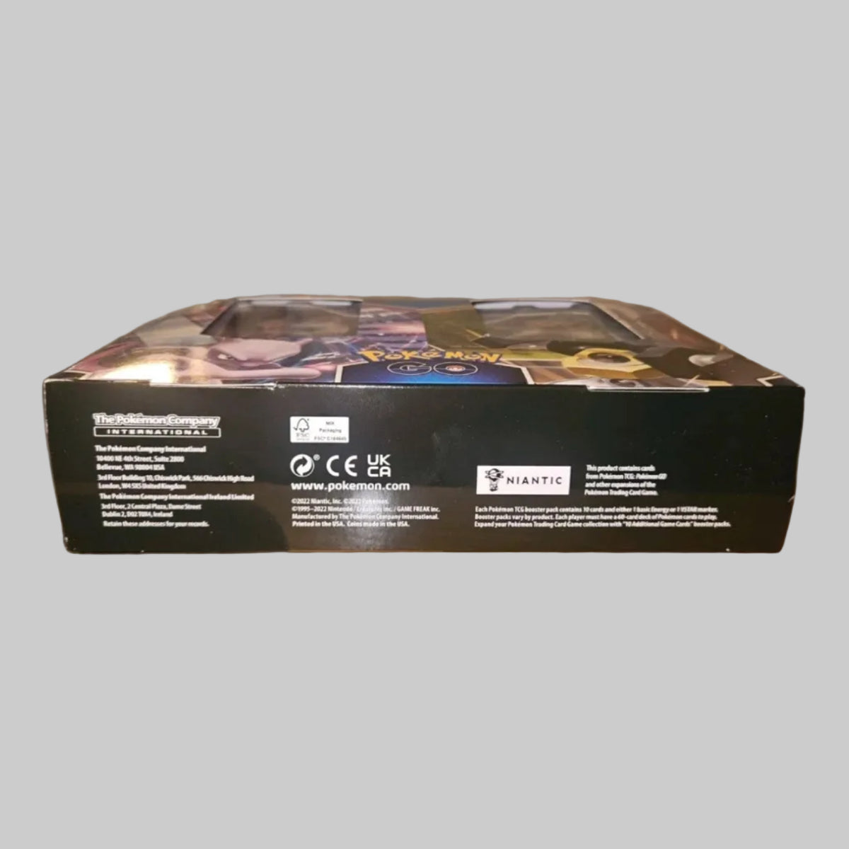 Pokemon TCG product on a side view in a gray neutral background.