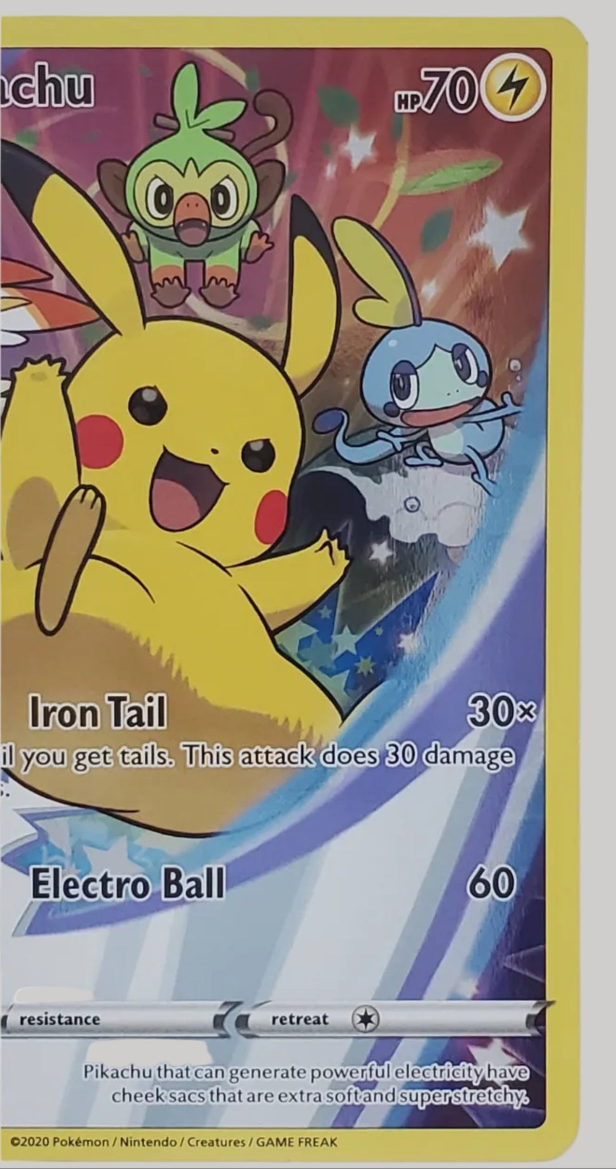 A close-up of a Pokémon trading card featuring Pikachu, with visible text including 'Iron Tail', 'Electro Ball', and 'hp70'. The card is photographed against a plain light background.