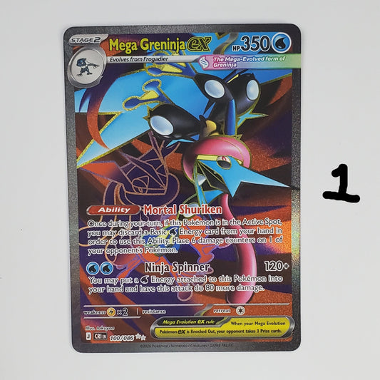 A single Pokémon trading card featuring Mega Greenivek, displayed against a plain white background with a keyboard partially visible at the bottom edge.