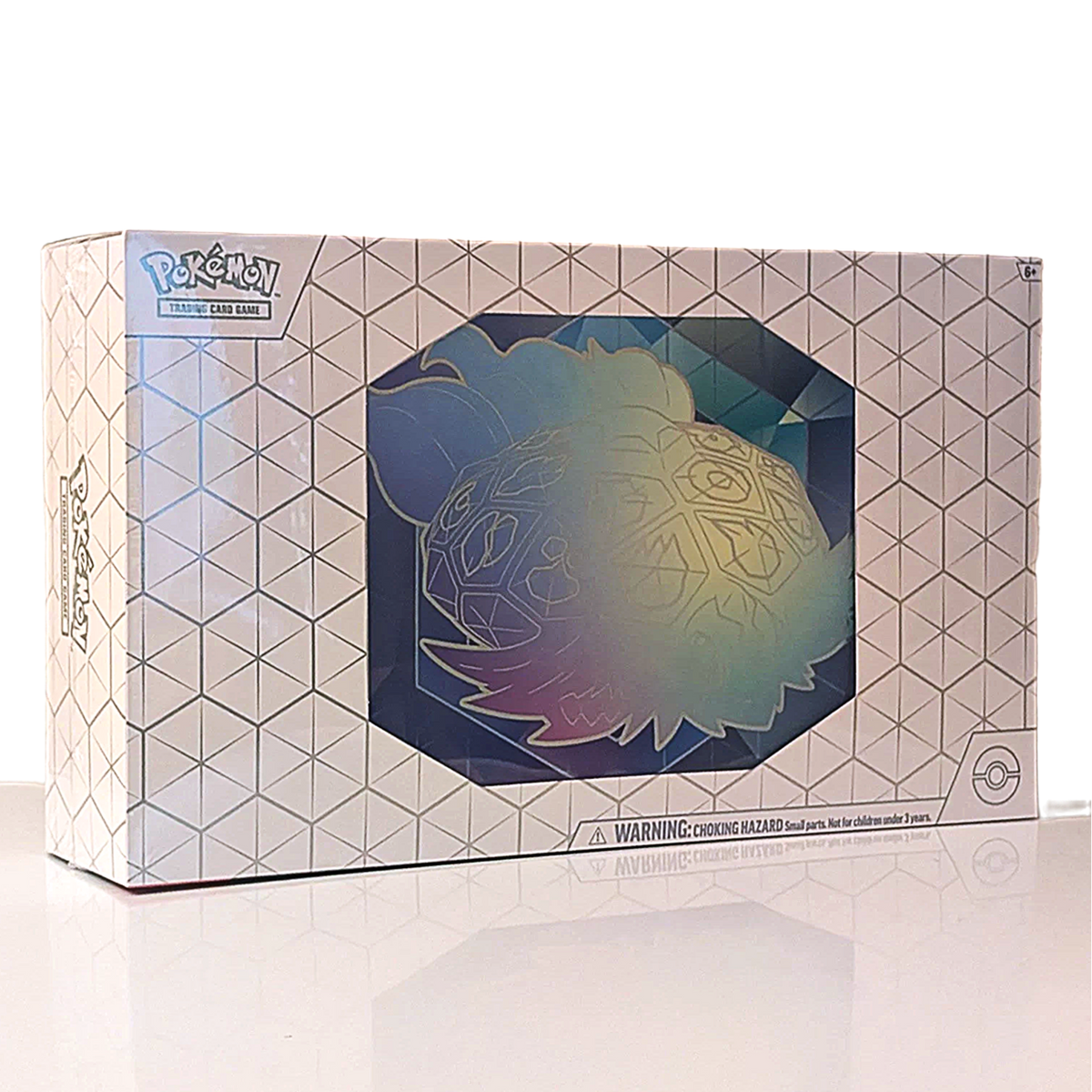 Pokémon Tera Blast 150th Anniversary Holographic Mystery Box, featuring a white geometric patterned box with a clear window displaying a colorful holographic Pokémon egg.
